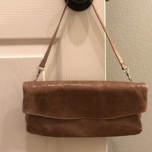 Gianni chianni tan leather clutch wristlet.